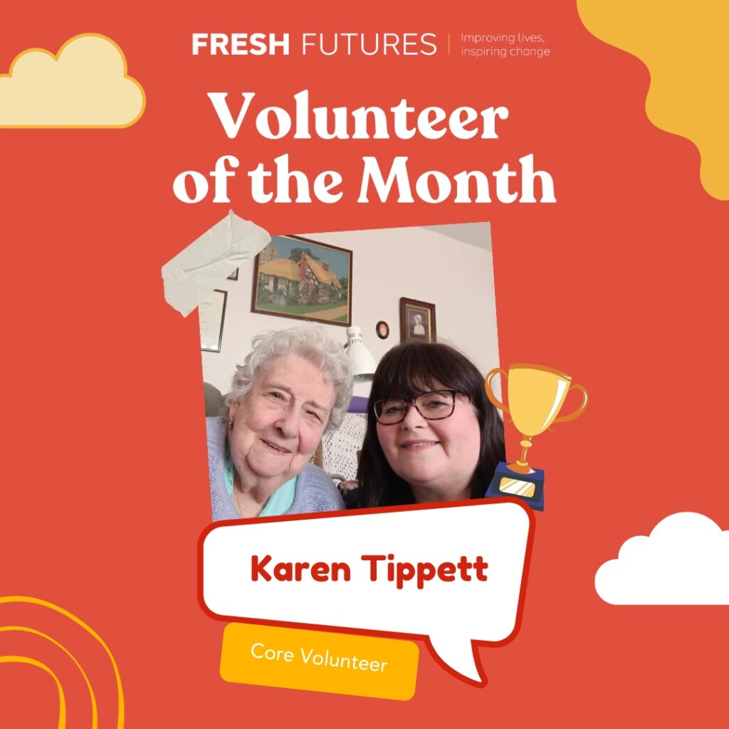 A digital graphic features a 'Volunteer of the Month' recognition for Karen Tippett, a core volunteer with Fresh Futures. The design has a bright orange background with playful cloud and swirl illustrations. At the top, the Fresh Futures logo is displayed alongside the tagline 'Improving lives, inspiring change.' The main focus is a cutout-style photo of Karen Tippett, a woman with dark hair and glasses, sitting beside an elderly woman with short white hair, both smiling warmly in a cozy home setting. A speech bubble contains Karen’s name, and below it, a yellow tag marks her role as 'Core Volunteer.' A small trophy icon is included as a symbol of recognition