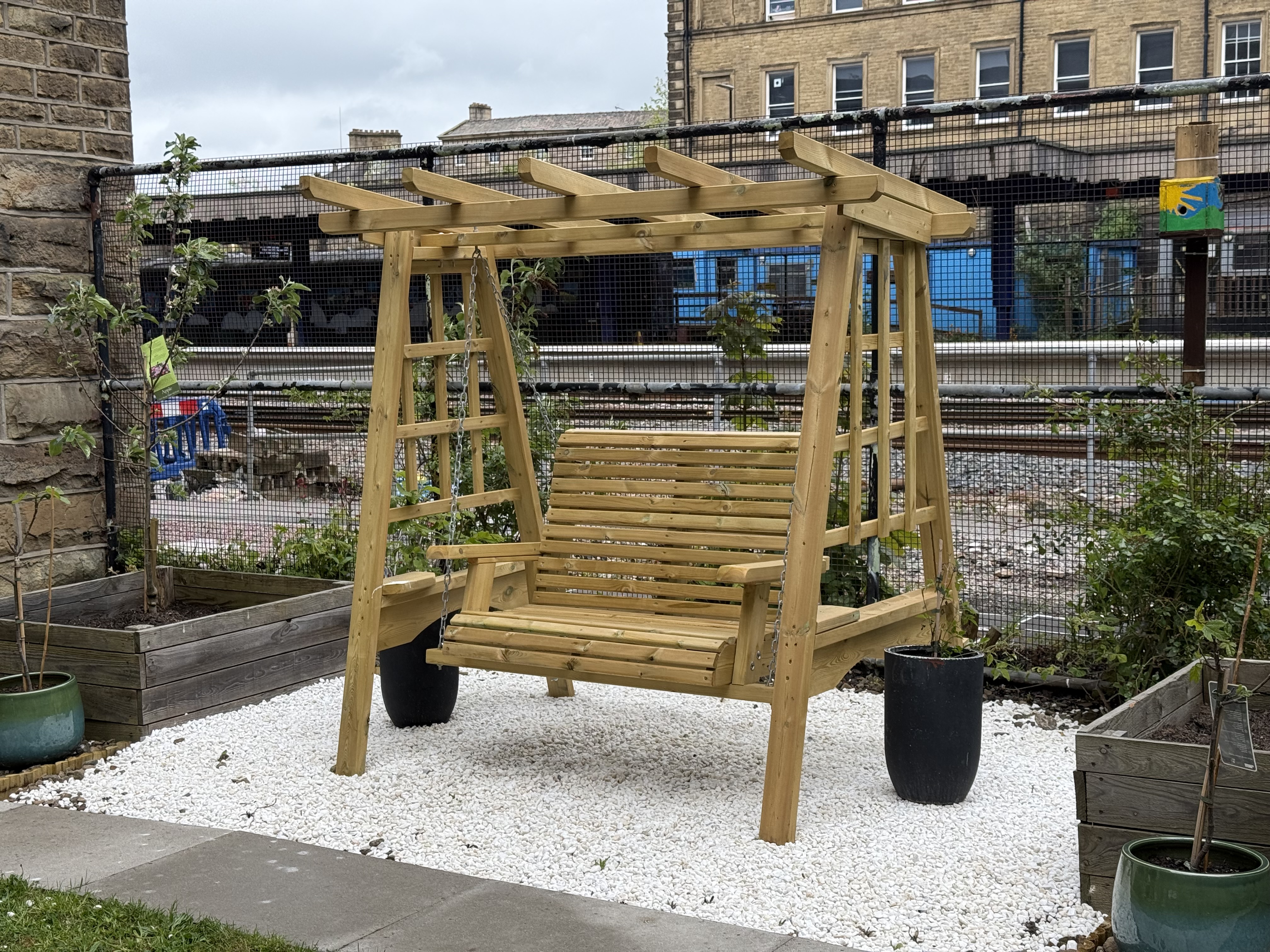 Garden swinging bench funded by Cummins