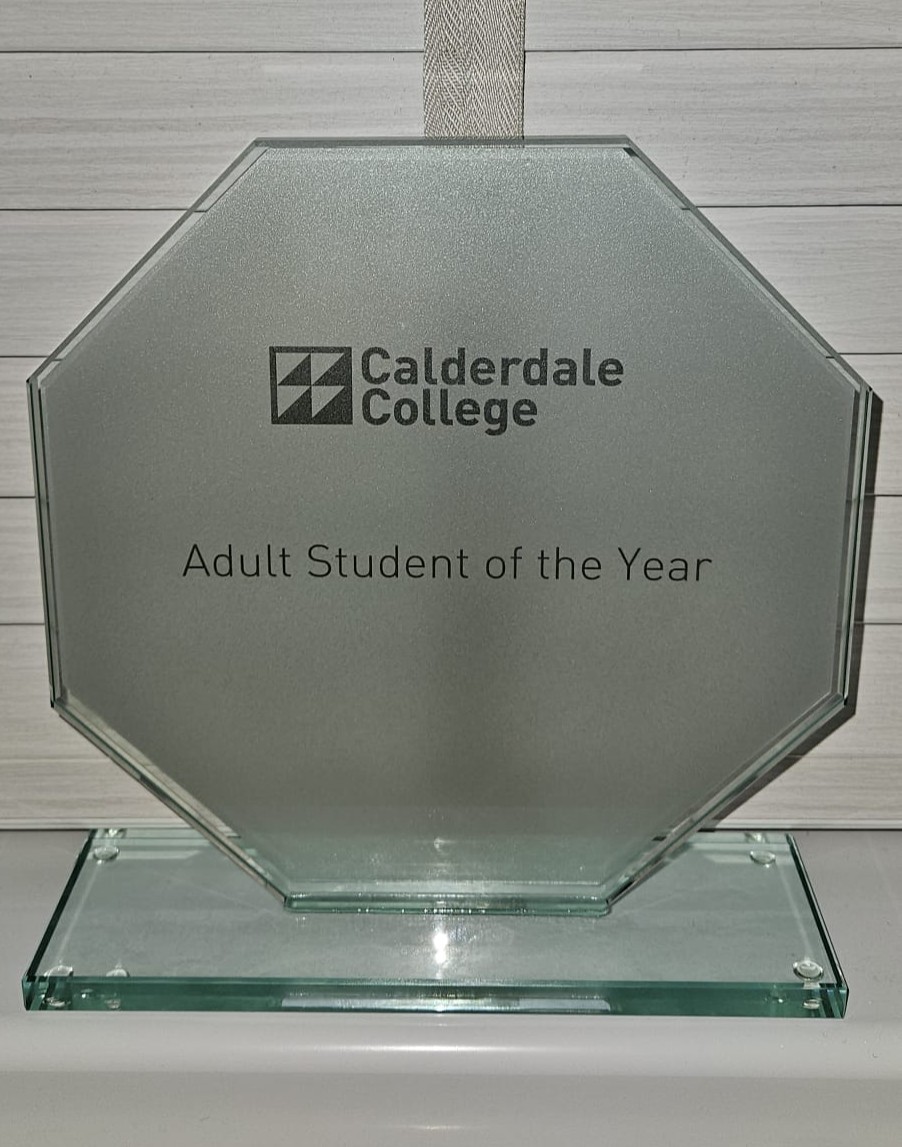 photo of adult student of the year plaque