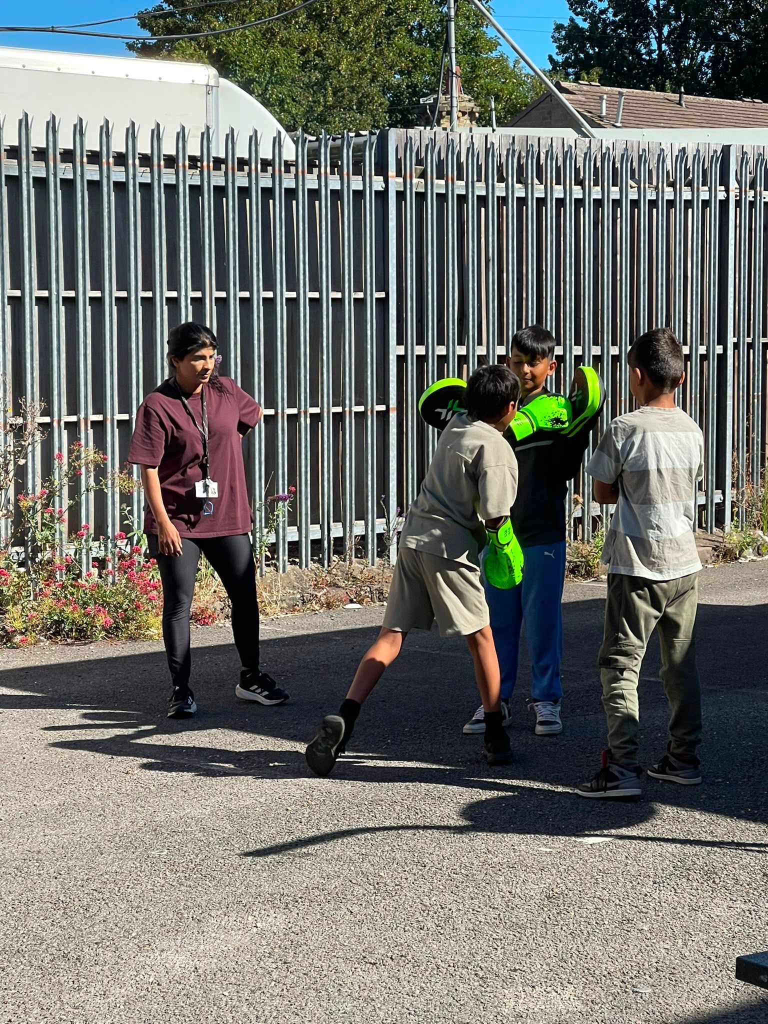 HAF children playing outside practising sparring